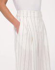 another tomorrow wide leg pleated trouser off white and black stripe on figure pocket detail