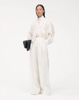 another tomorrow wide leg pleated trouser off white and black stripe on figure front