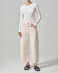 citizens of humanity ayla raw hem crop jean in almondette on figure front