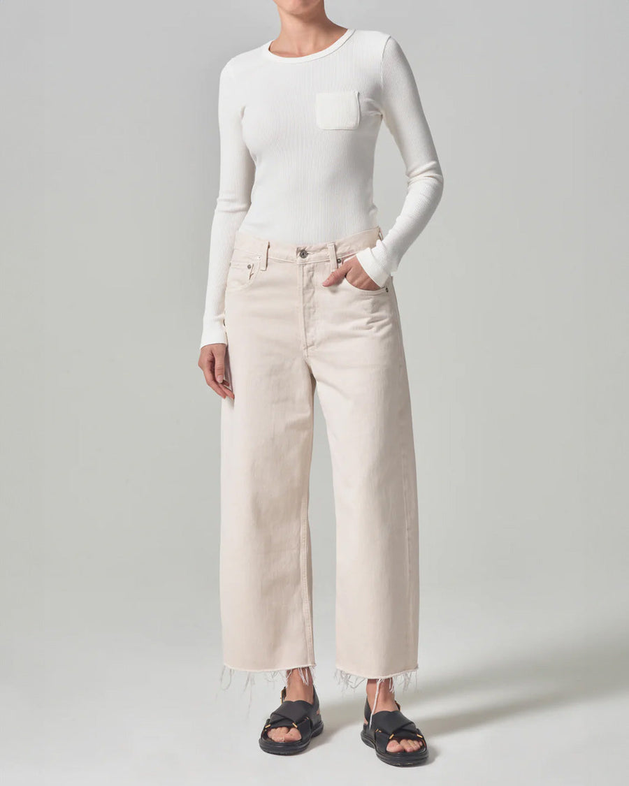 citizens of humanity ayla raw hem crop jean in almondette on figure front