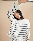 a ligne LEO SWEATER CREAM NAVY on figure front detail