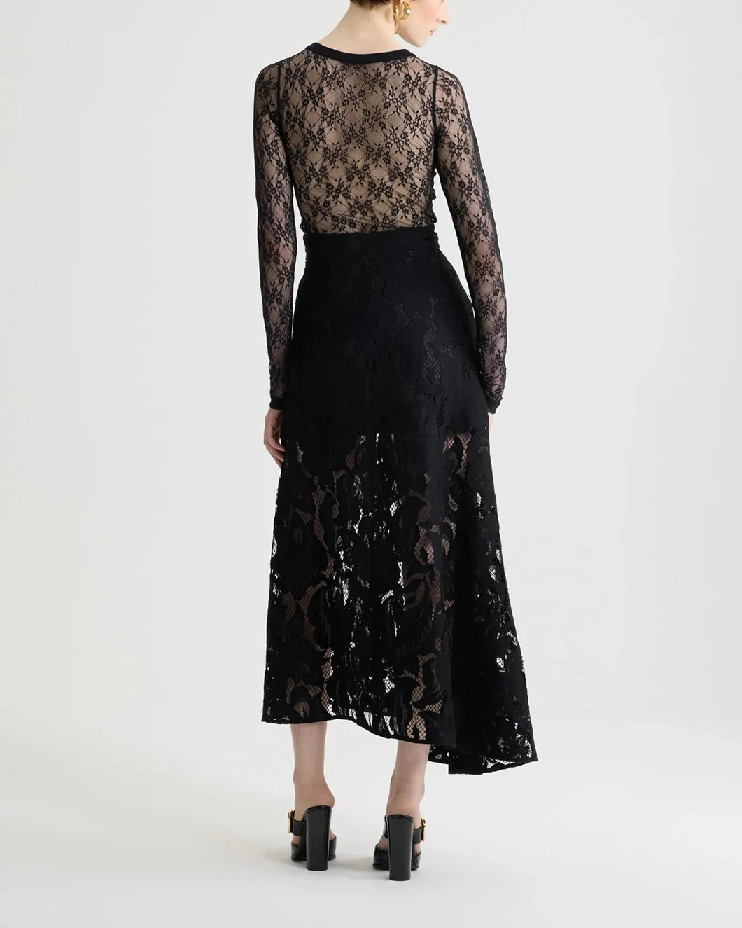 patou black asymmetric midi skirt in organic cotton blend lace on model back view