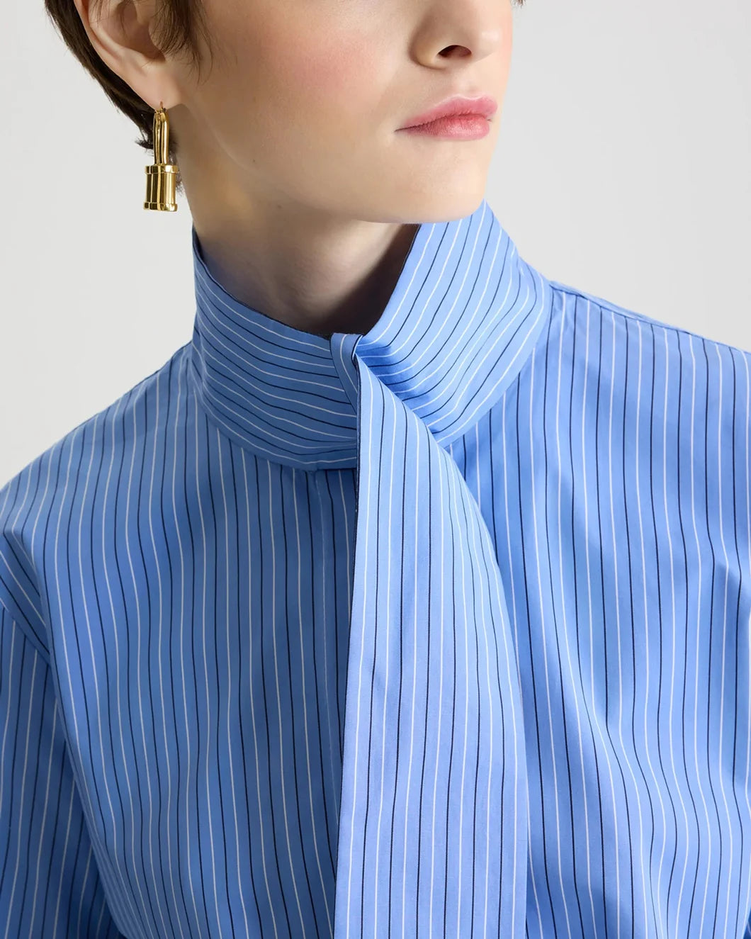 patou scarf collar blouse in printed organic cotton poplin ice blue stripe on model collar detail view