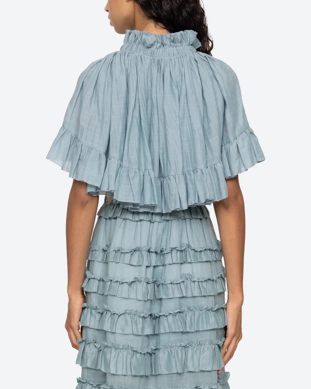 sea ny Anise Solid Capelet blue on figure back view