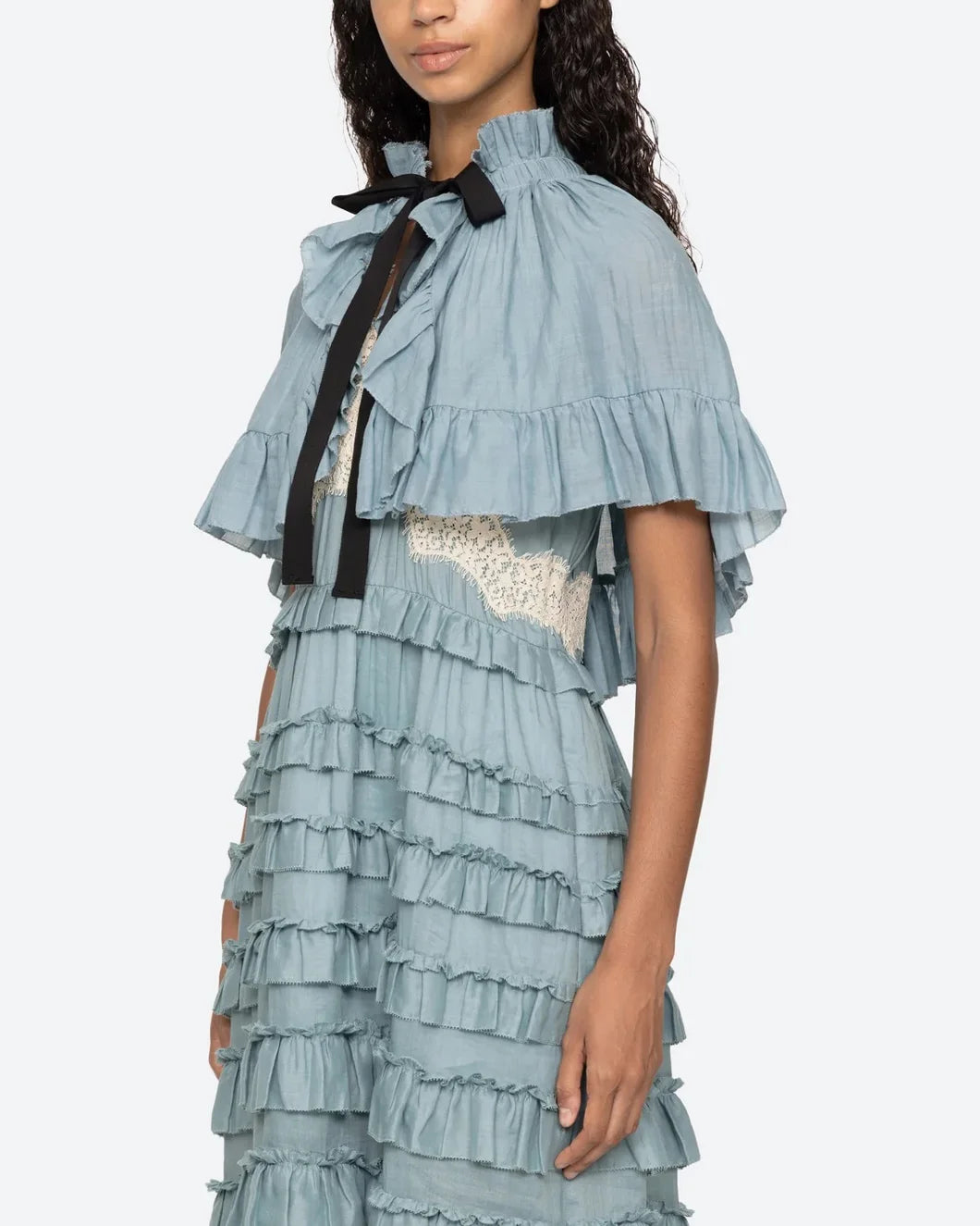 sea ny Anise Solid Capelet blue on figure left side view