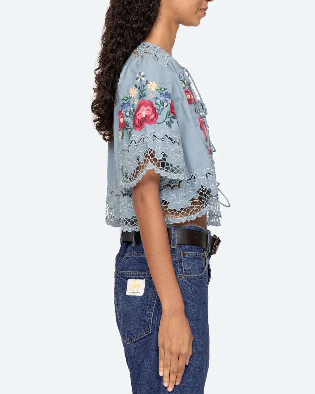 sea ny Rosaline Short Sleeve front tie cropped Top embroidered blue floral on figure side