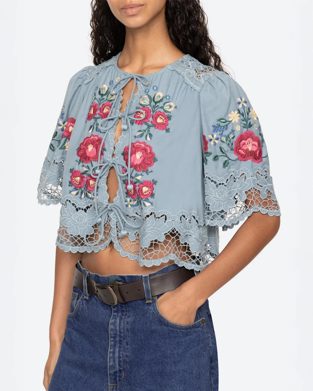 sea ny Rosaline Short Sleeve front tie lace trim Top embroidered blue floral on figure side