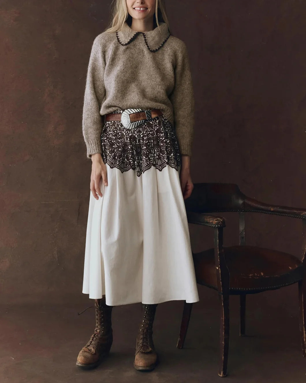 model wearing the Regency Skirt in cream with brown western lace print from the great shown from the front in full length