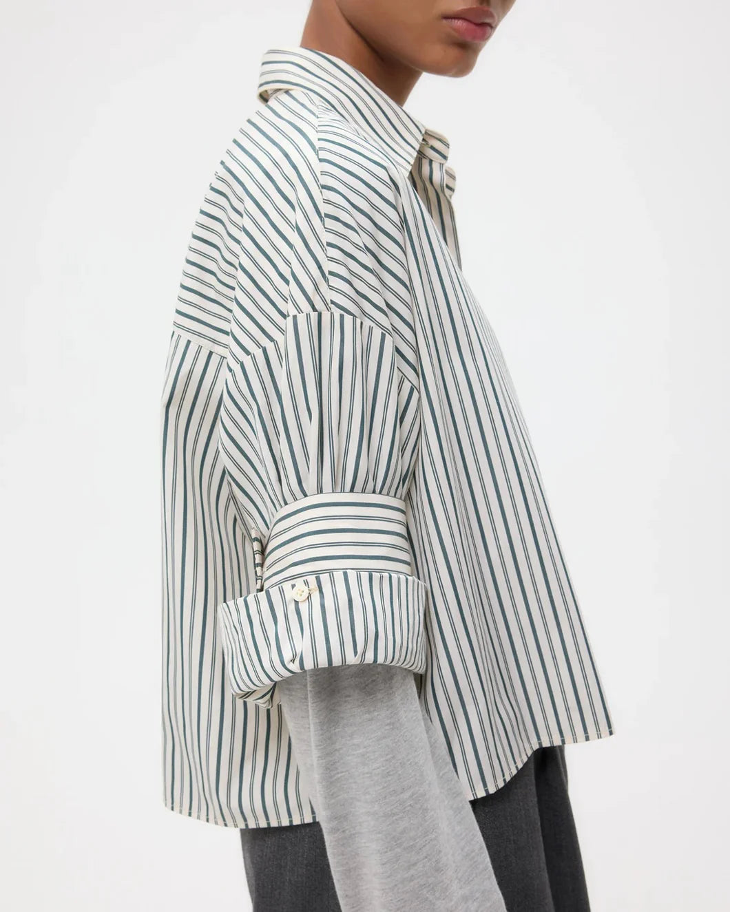 twp next ex button up shirt in ivory and cilantro green stripes on model side detail view