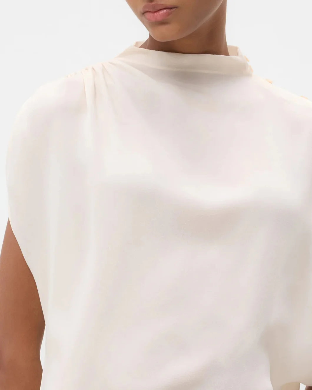 twp Silk Georgette Wish You Would Top in light pink tint on model front collar detail view