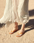 maria farro lex flip flop in natural, tan on figure beach